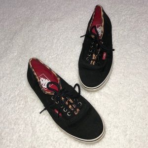 Black Vans with cheetah print edge